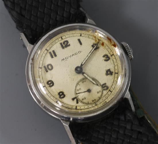 A gentlemans stainless steel Movado manual wind wrist watch.